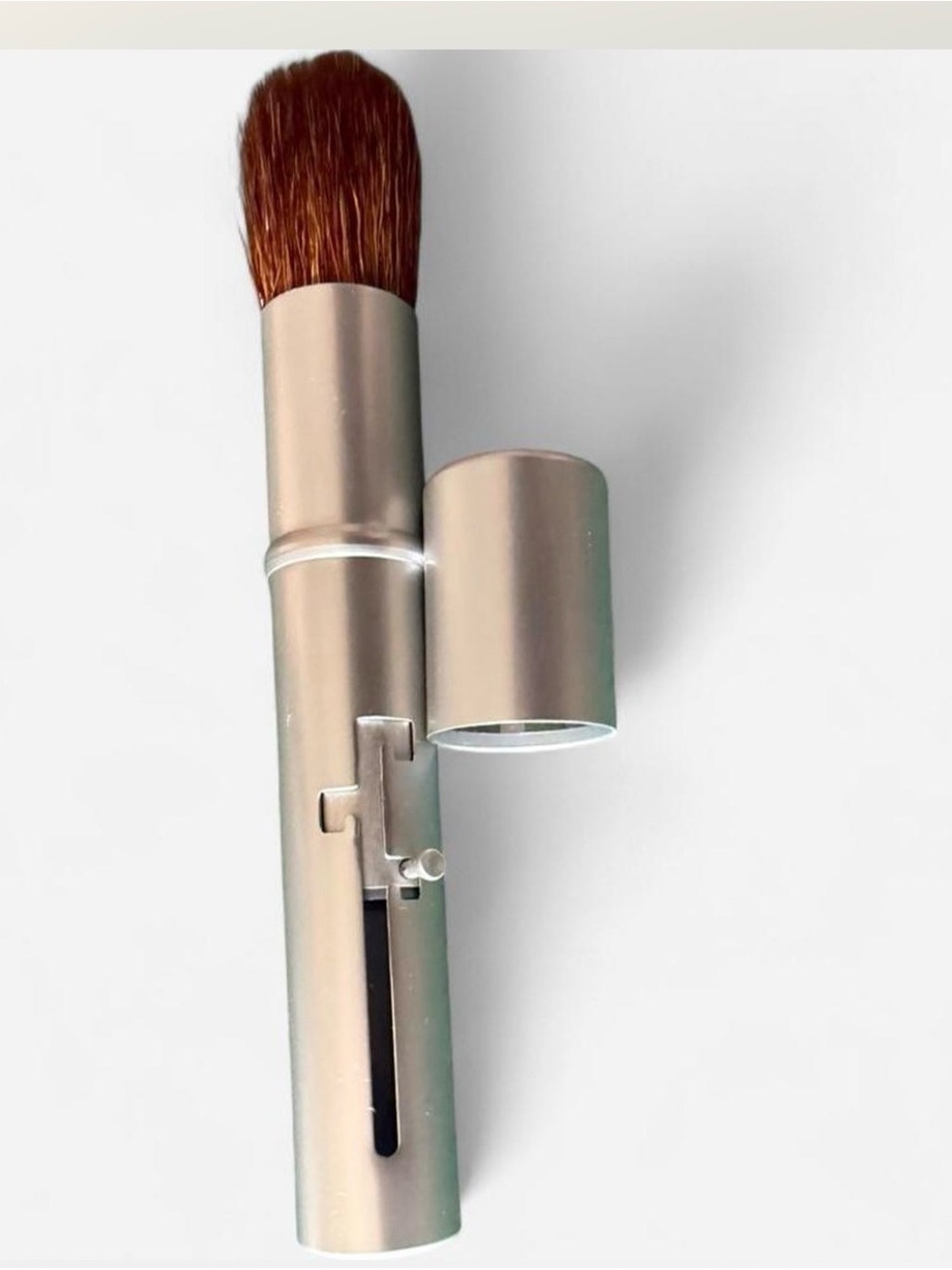 I.d. Bare Escentials retractable travel makeup Brush.